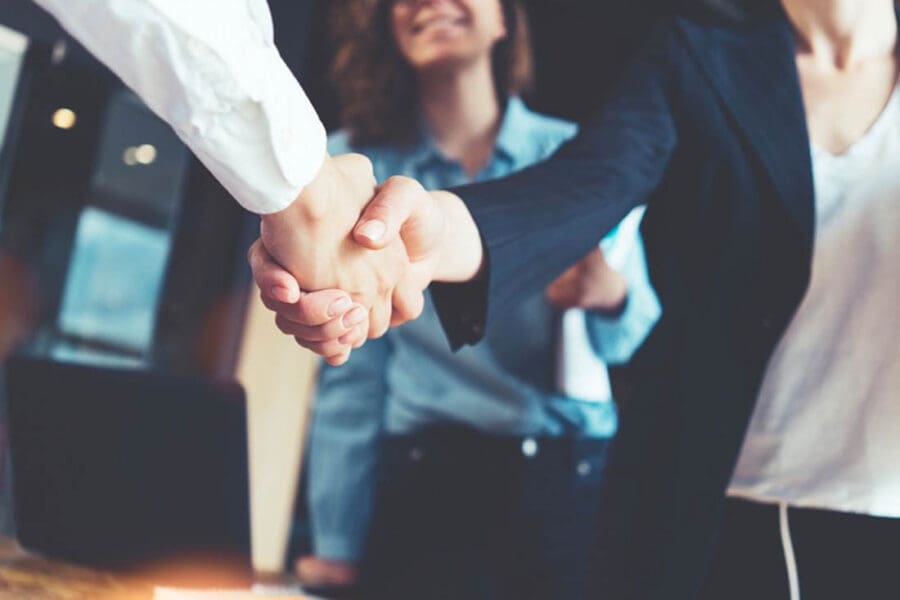 Insurance Agents & Brokers - Strong Handshake with Colleagues